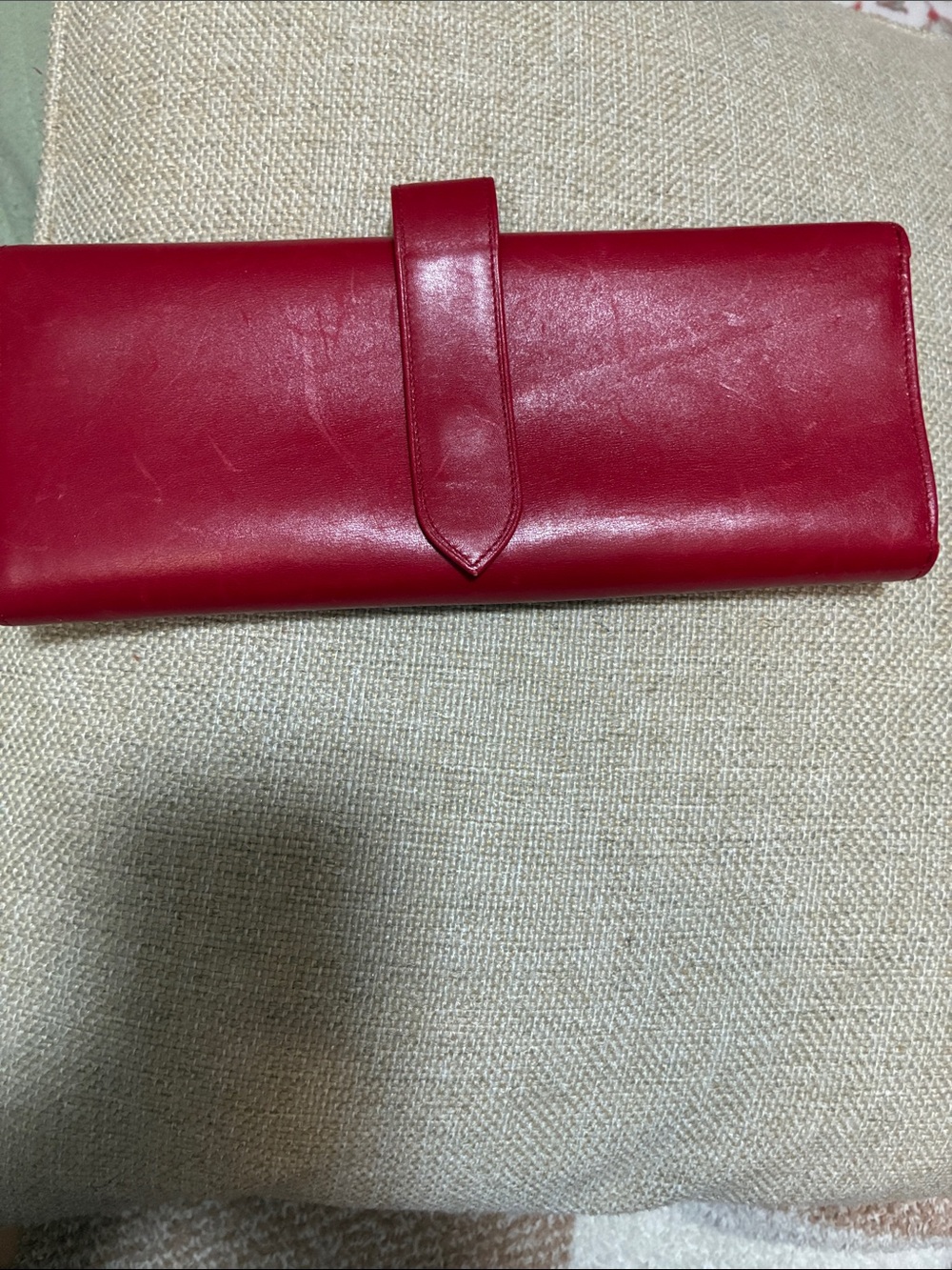 Tiffany &Co. Red leather jewelry roll case.